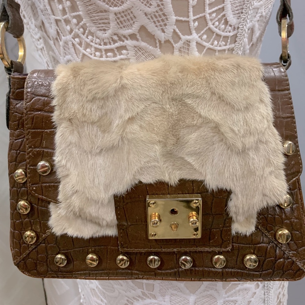 Mink and leather women’s shoulder bag.